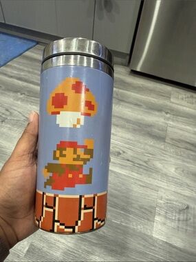 Nintendo Pixel Mario Tumbler - Light Blue with Red & Orange
